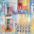 crumbling french facade in blues and yellows, with lettering and numbers
